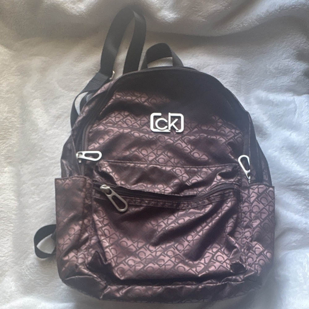 Calvin Klein Women’s Brown Monogram Backpack Zip Outer Pockets Black Straps